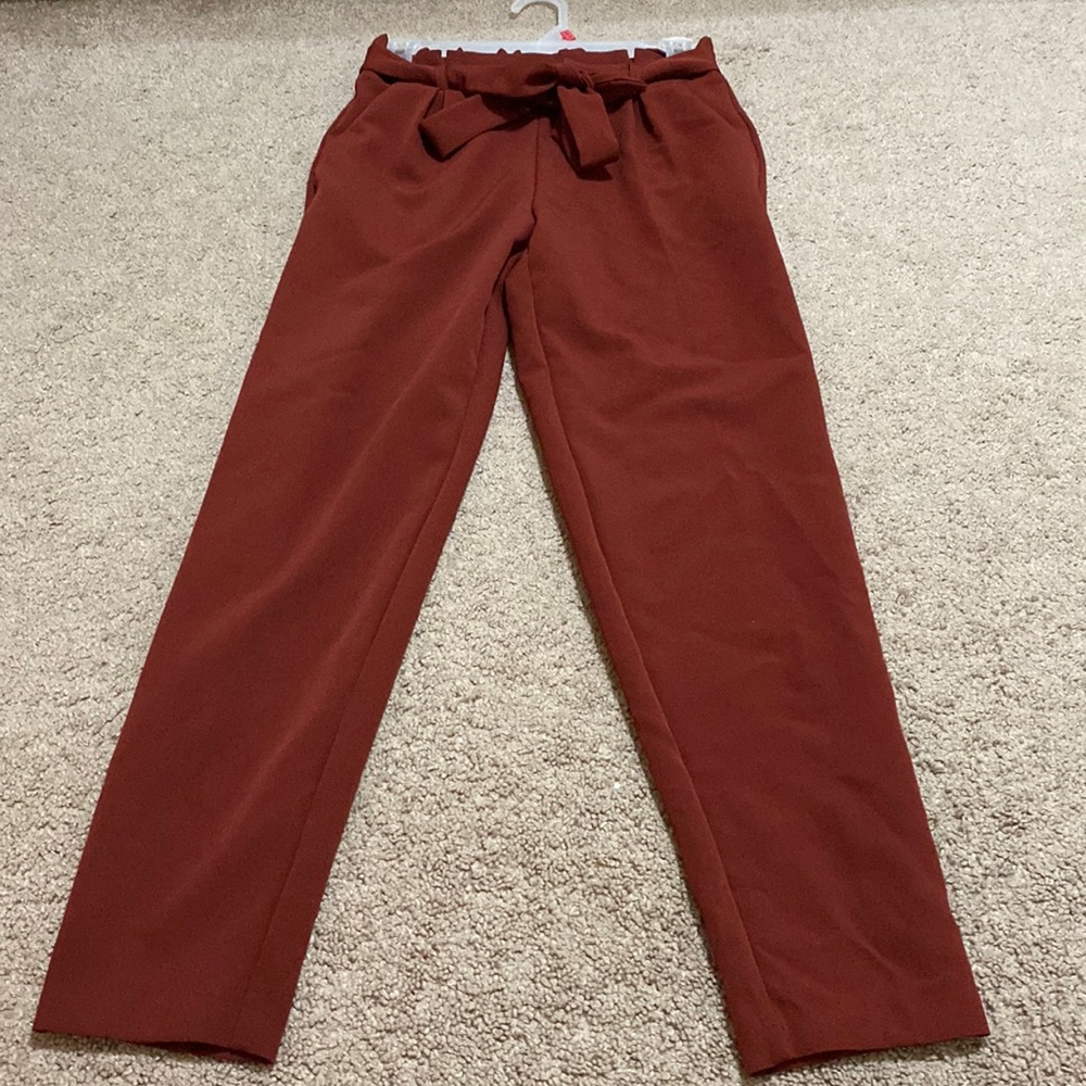 Beautiful maroon business pant. Size small, has laces to tie knots and style.